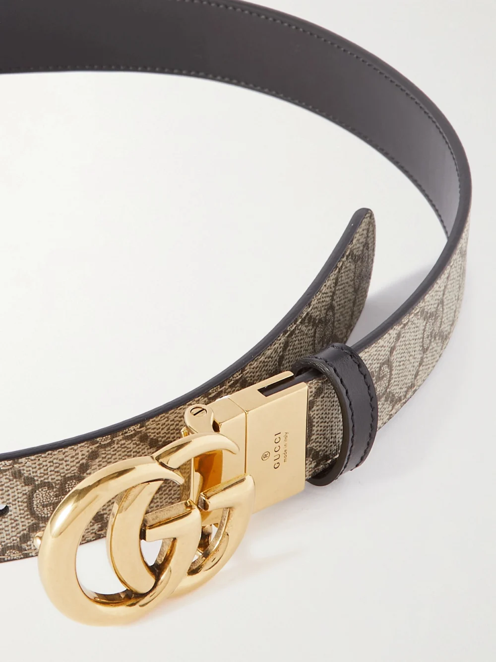 Close-up detail of the Gucci Reversible Leather and Printed Coated-canvas Belt