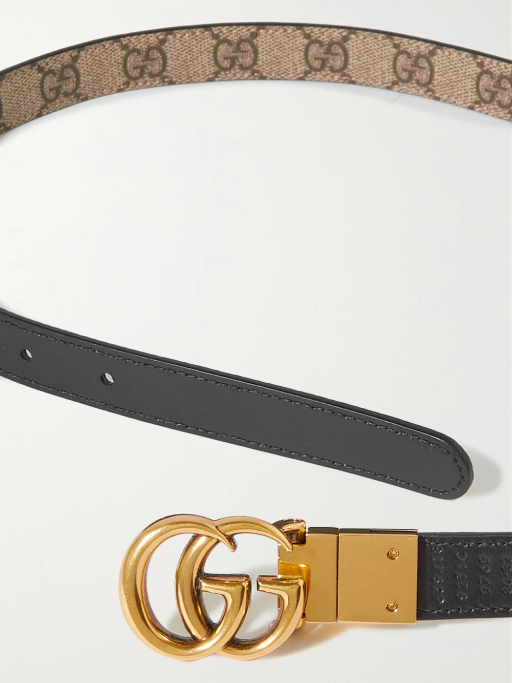 Close-up detail of the Gucci Reversible Printed Coated-canvas and Leather Belt