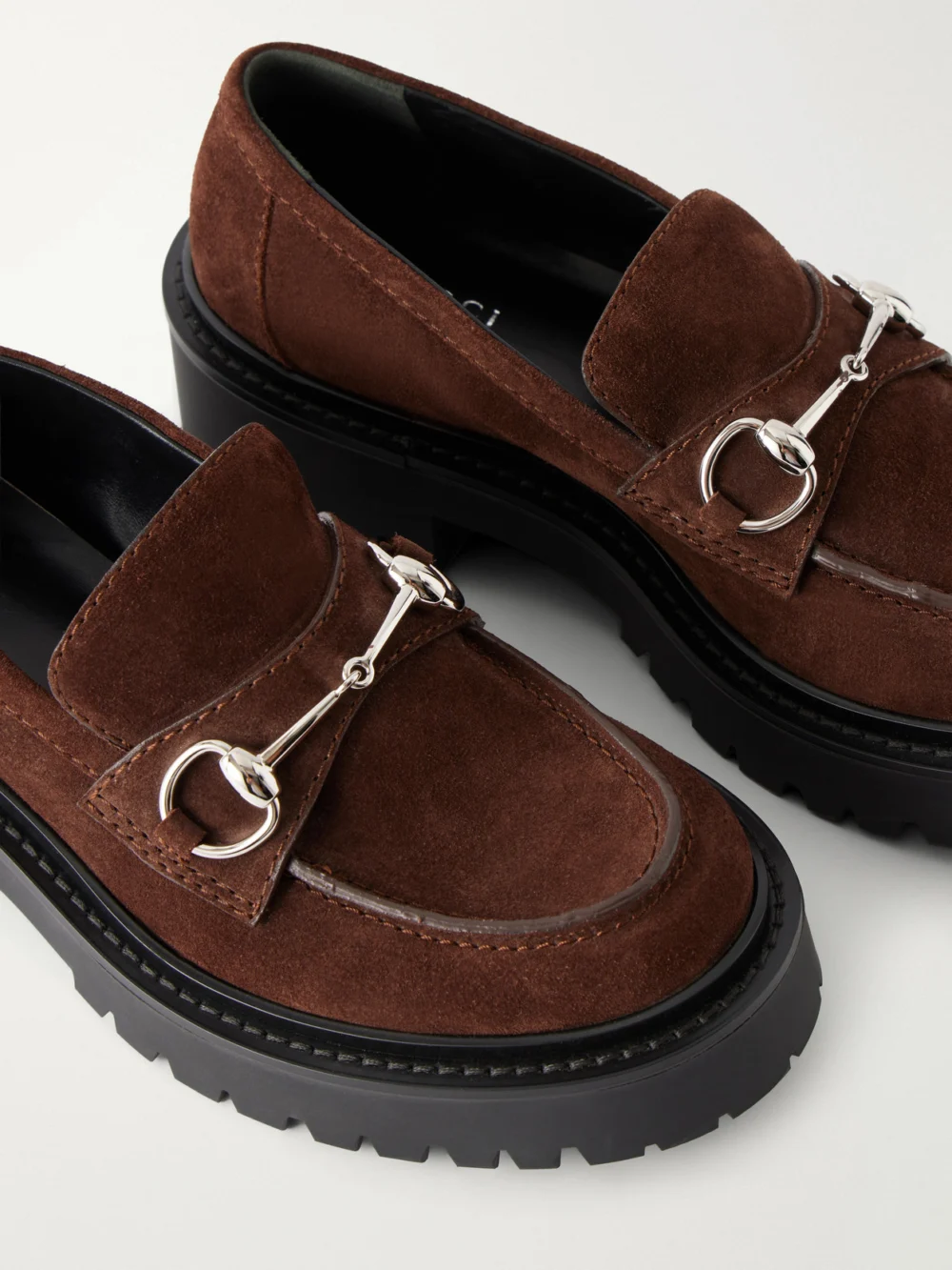Close-up detail of the Gucci Rhody Horsebit-detailed Suede Loafers