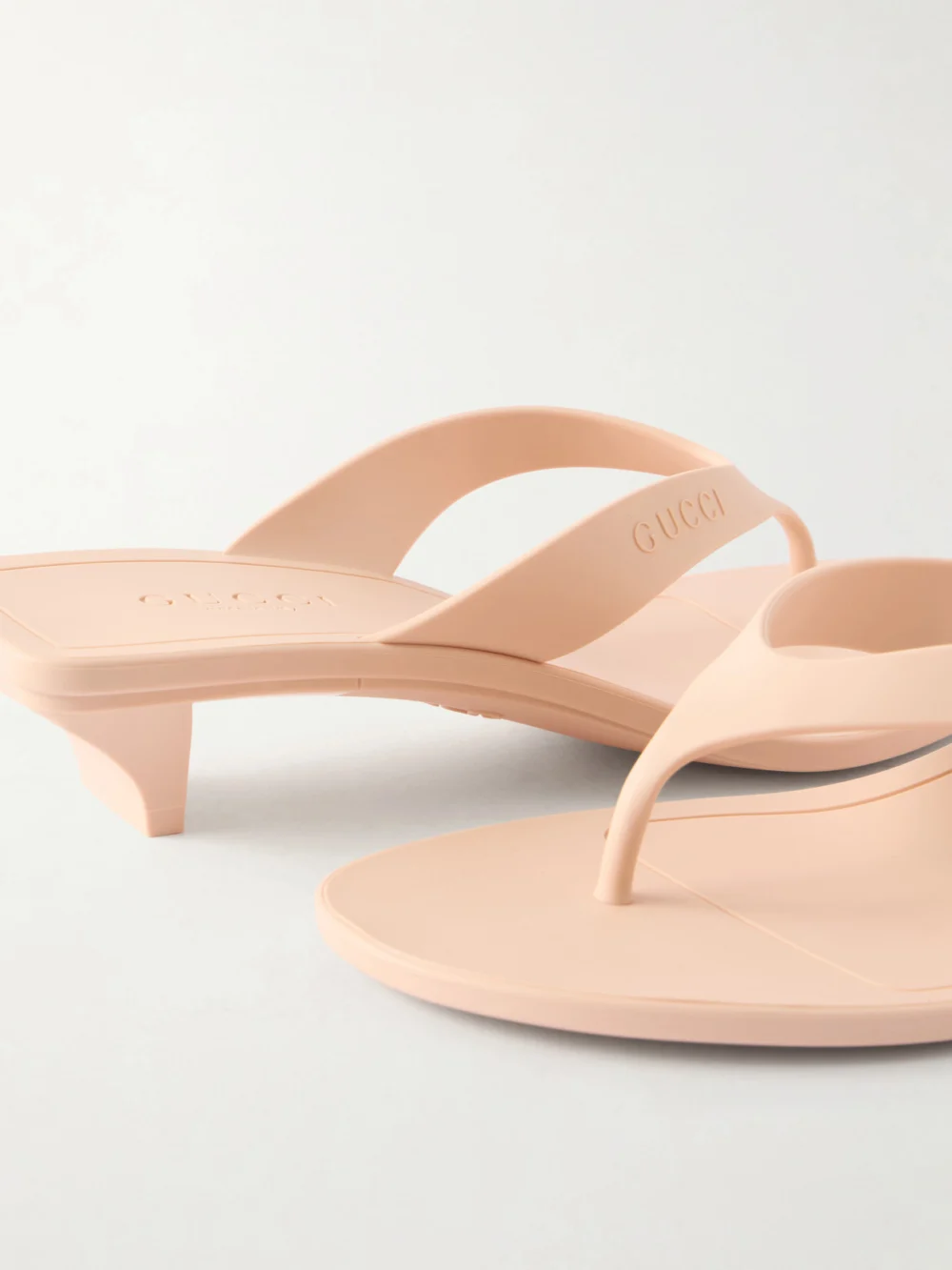Close-up detail of the Gucci Rubber Sandals