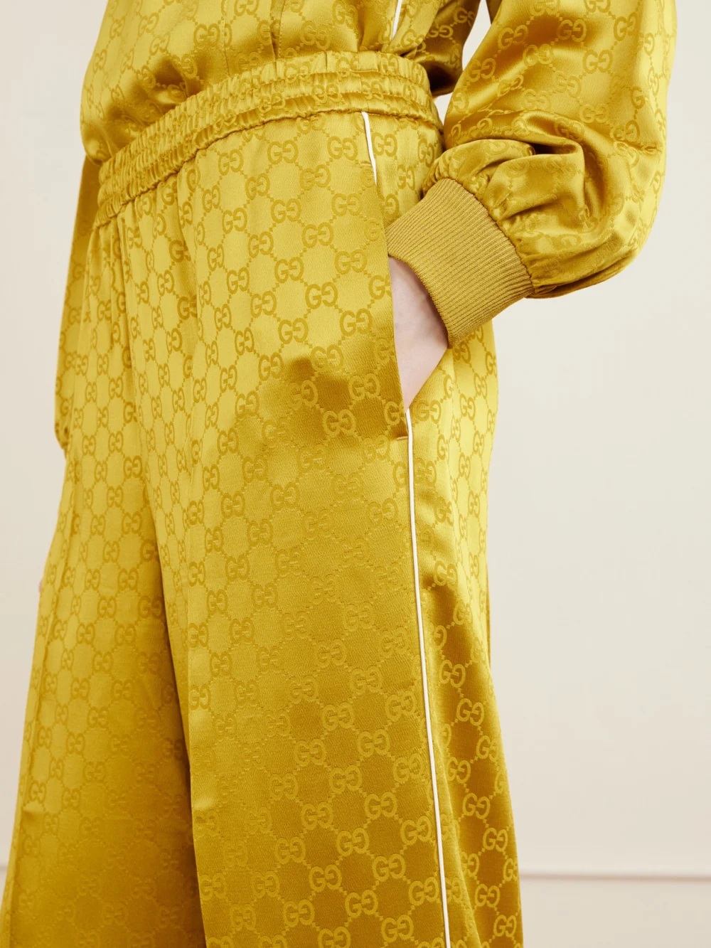 Close-up detail of the Gucci Satin-jacquard Straight-leg Pants