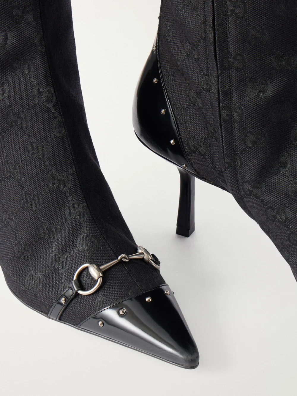 Close-up detail of the Gucci Savoy Horsebit-embellished Leather-trimmed Canvas-jacquard Knee Boots