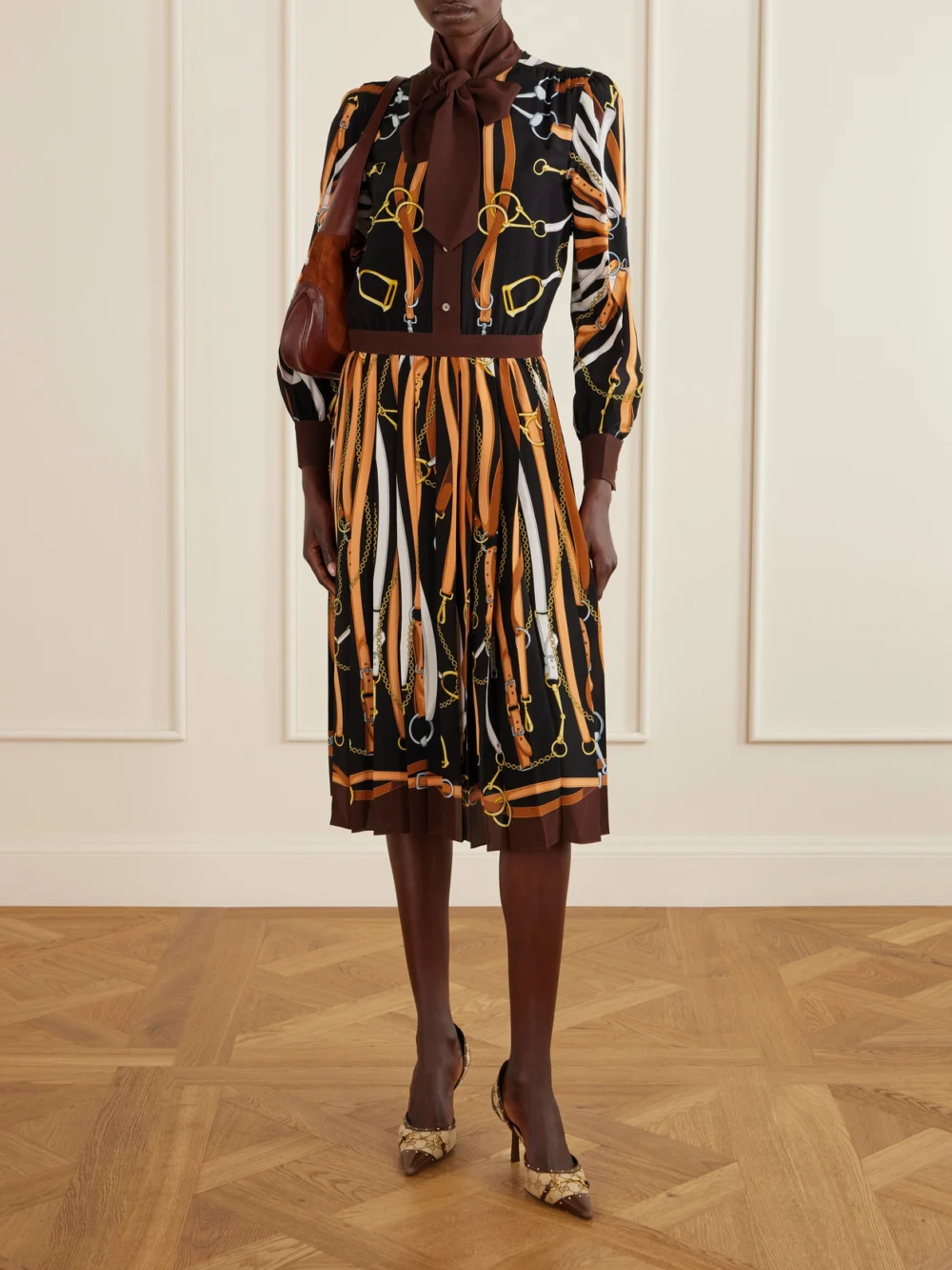 Gucci Savoy Horsebit-embellished Leather-trimmed Canvas-jacquard Pumps, styled view