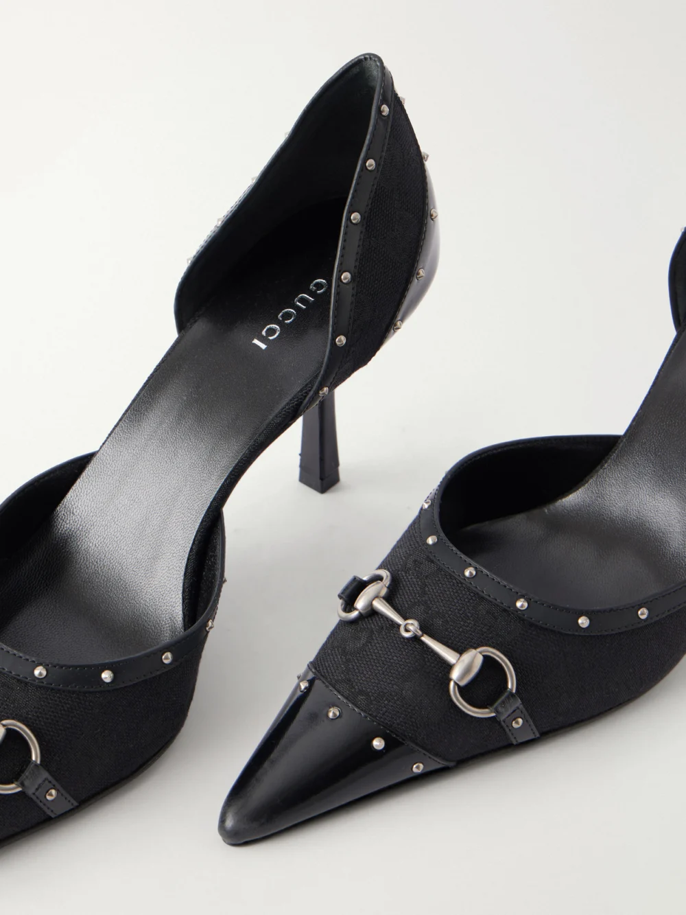 Close-up detail of the Gucci Savoy Horsebit-embellished Leather-trimmed Canvas-jacquard Pumps