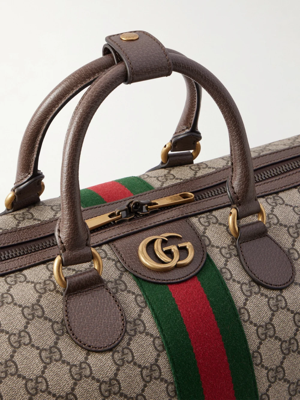 Close-up detail of the Gucci Savoy Leather Coated Canvas-jacquard Tote