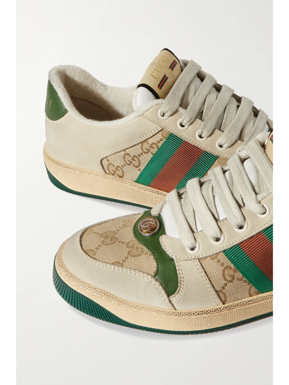 Close-up detail of the Gucci Screener Suede, Distressed Leather and Canvas Sneakers