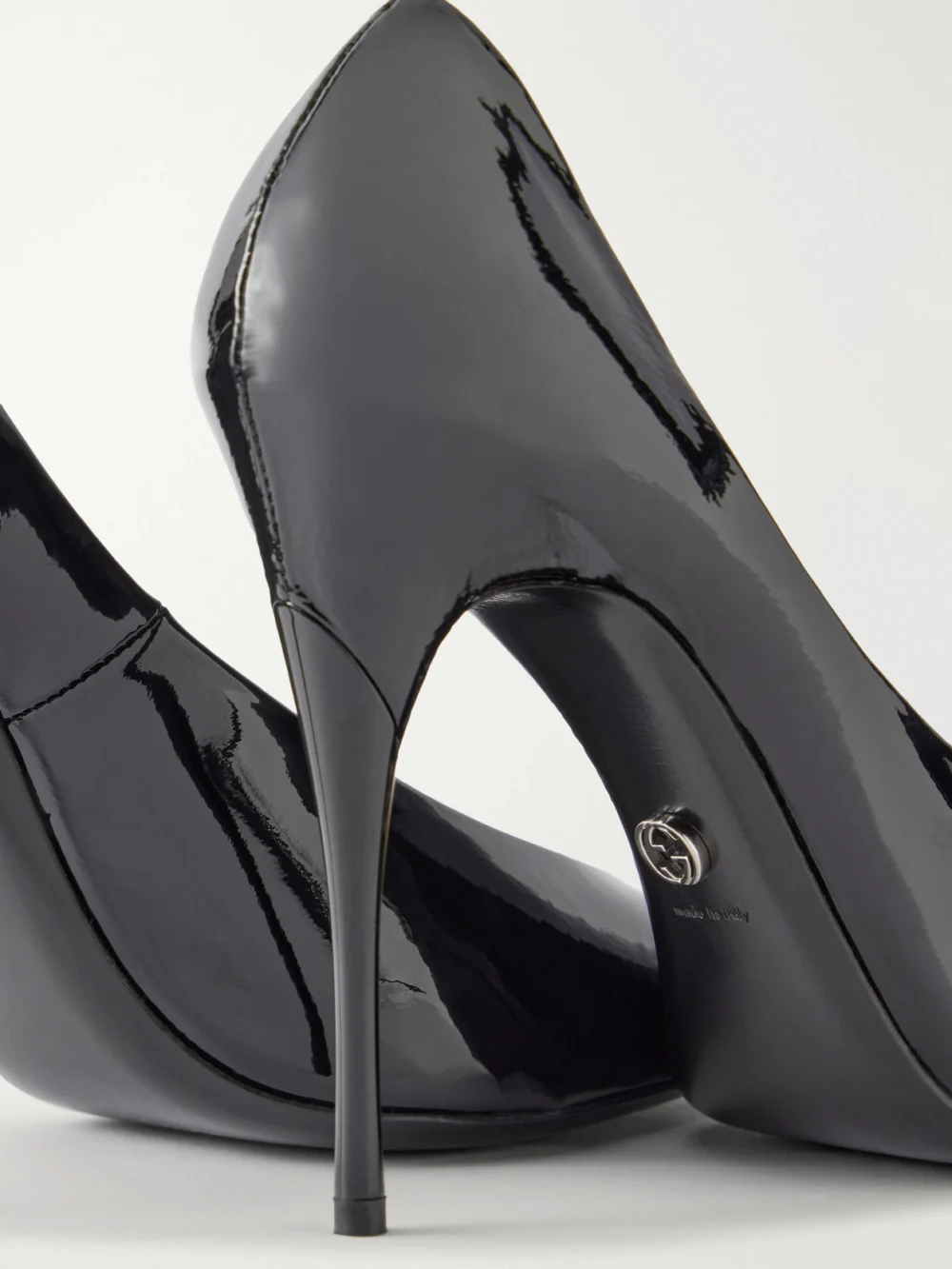 Close-up detail of the Gucci Sharp Patent-leather Pumps