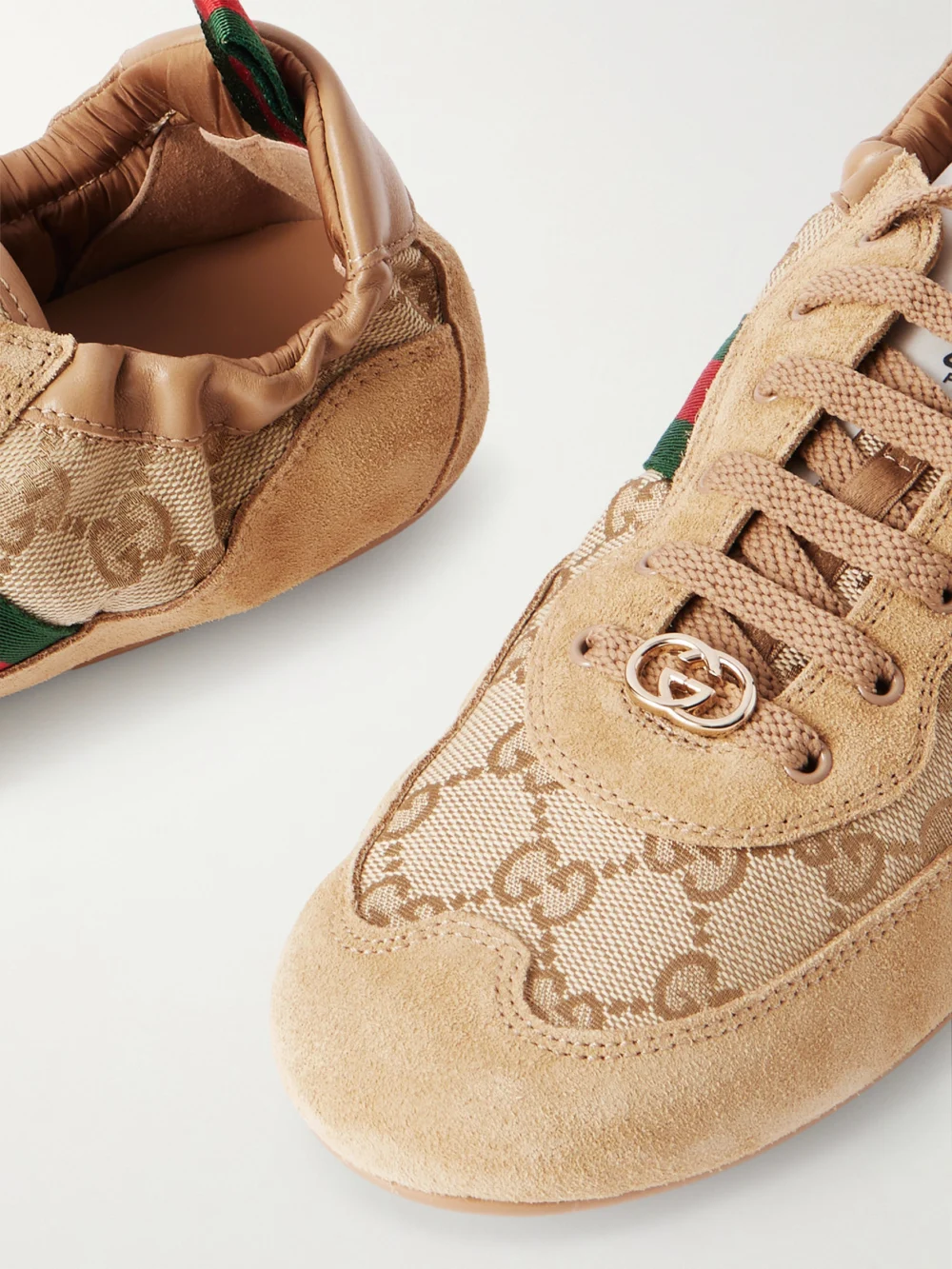 Close-up detail of the Gucci Shift Webbing and Leather-trimmed Canvas-jacquard and Suede Sneakers