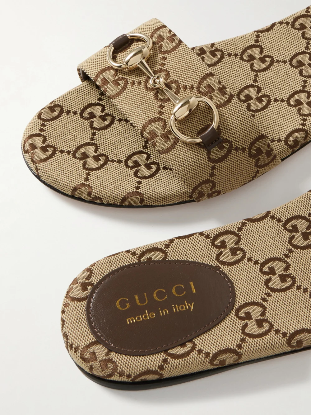 Close-up detail of the Gucci Siaga Horsebit-detailed Canvas-jacquard Slides