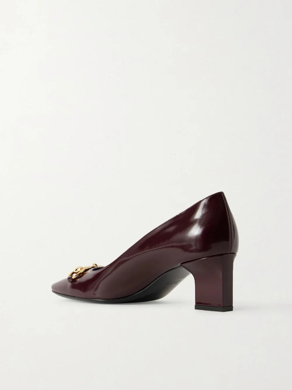Back view of the Gucci Signora 55 Horsebit-embellished Glossed Leather Pumps