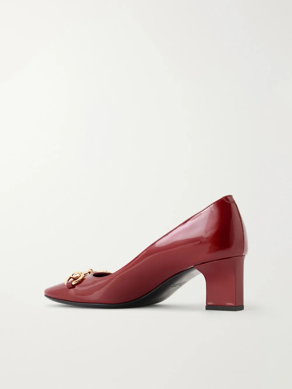 Back view of the Gucci Signora 55 Horsebit-embellished Patent-leather Pumps