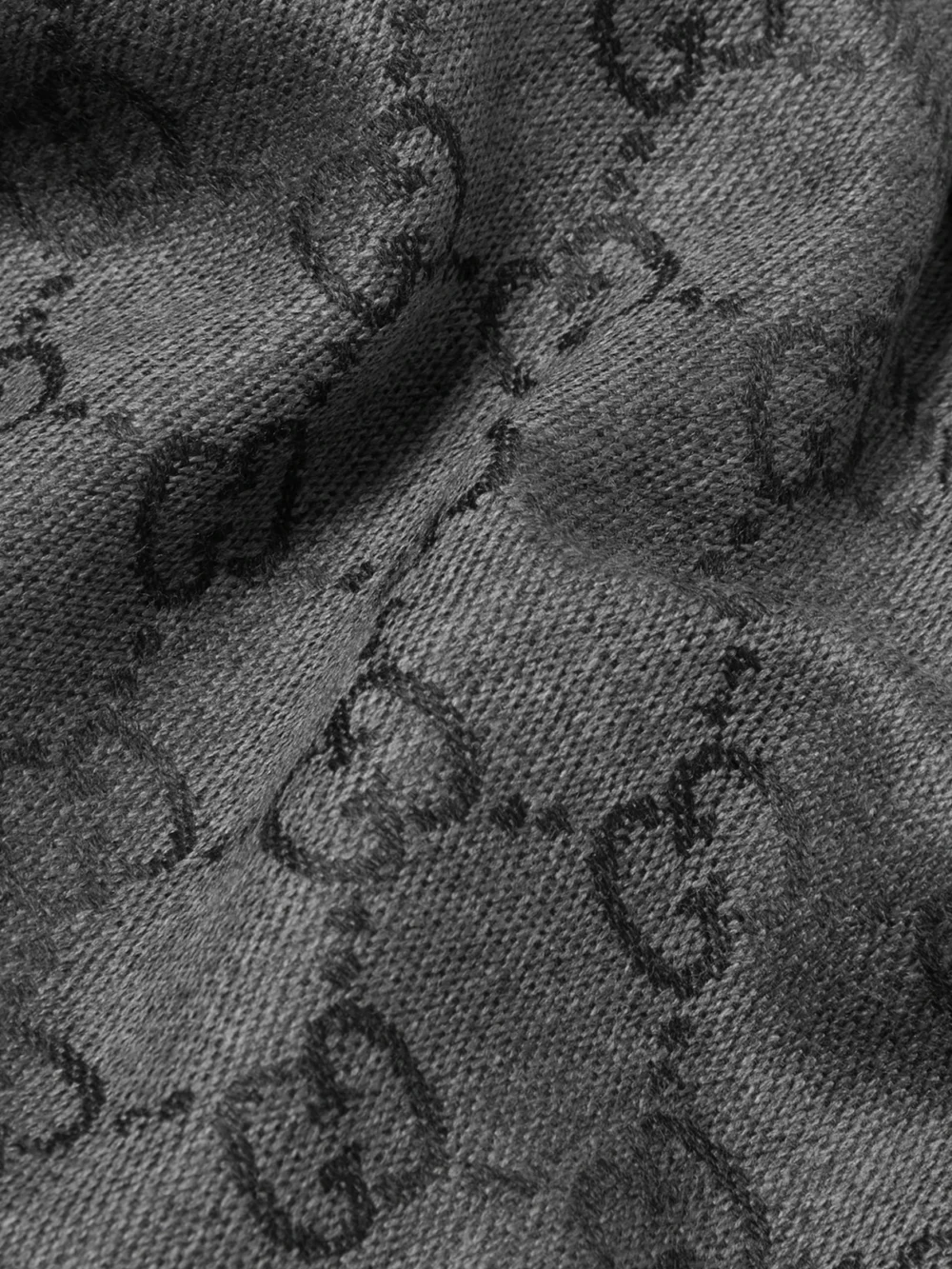 Close-up detail of the Gucci Sten Reversible Fringed Organic Wool-jacquard Scarf