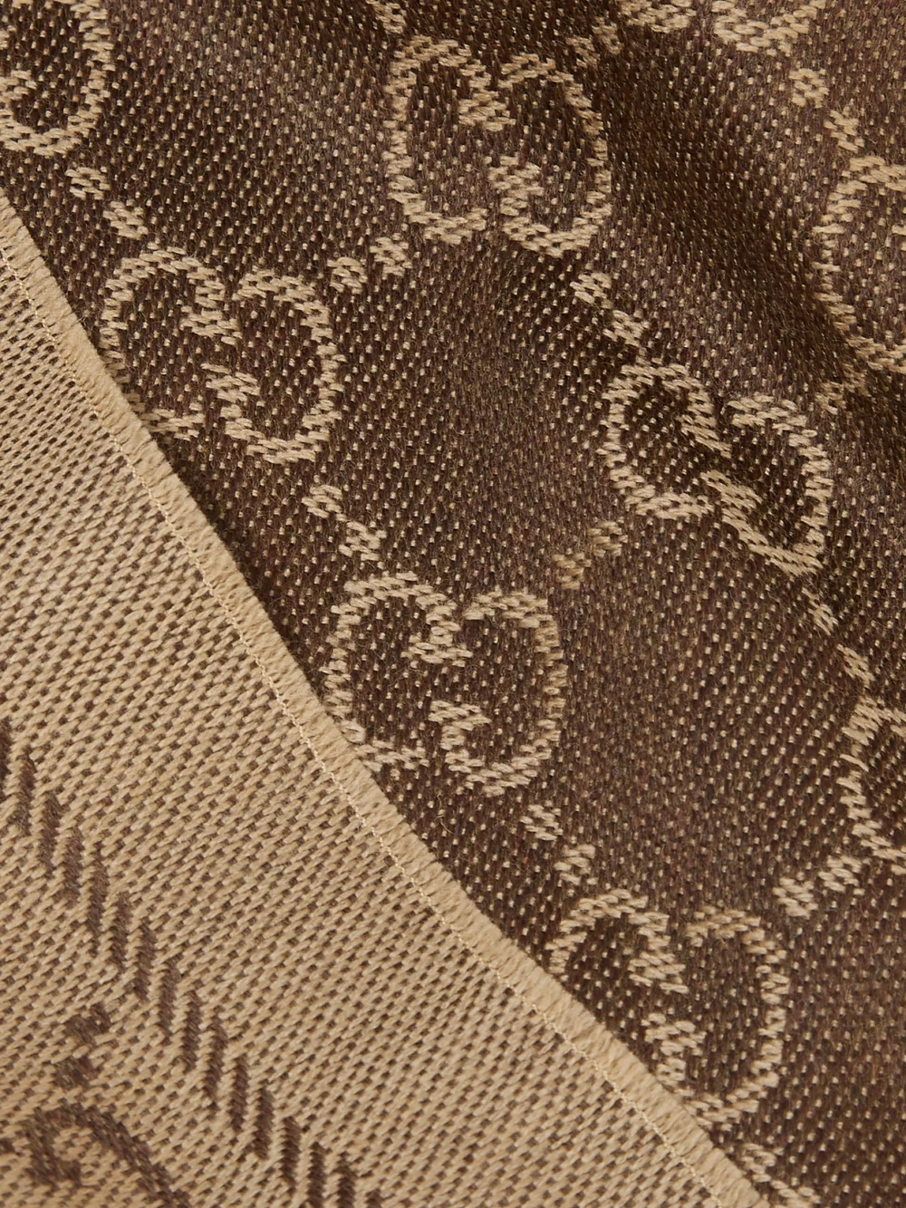 Close-up detail of the Gucci Sten Reversible Fringed Organic Wool-jacquard Scarf