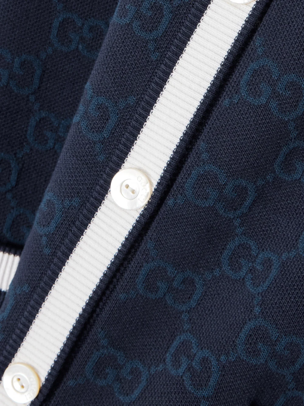 Close-up detail of the Gucci Striped Jacquard-knit Cotton Cardigan