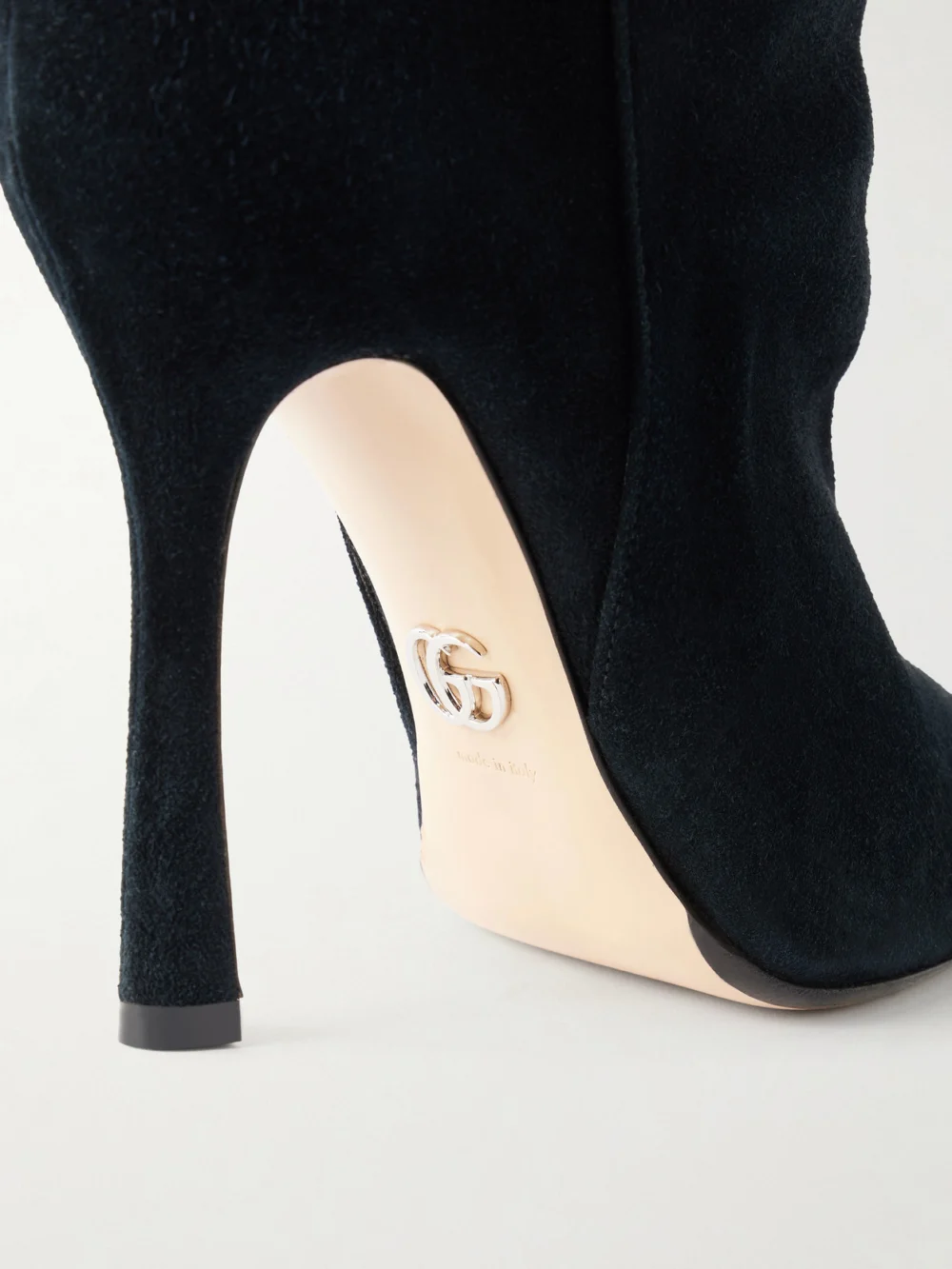 Close-up detail of the Gucci Suede Knee Boots