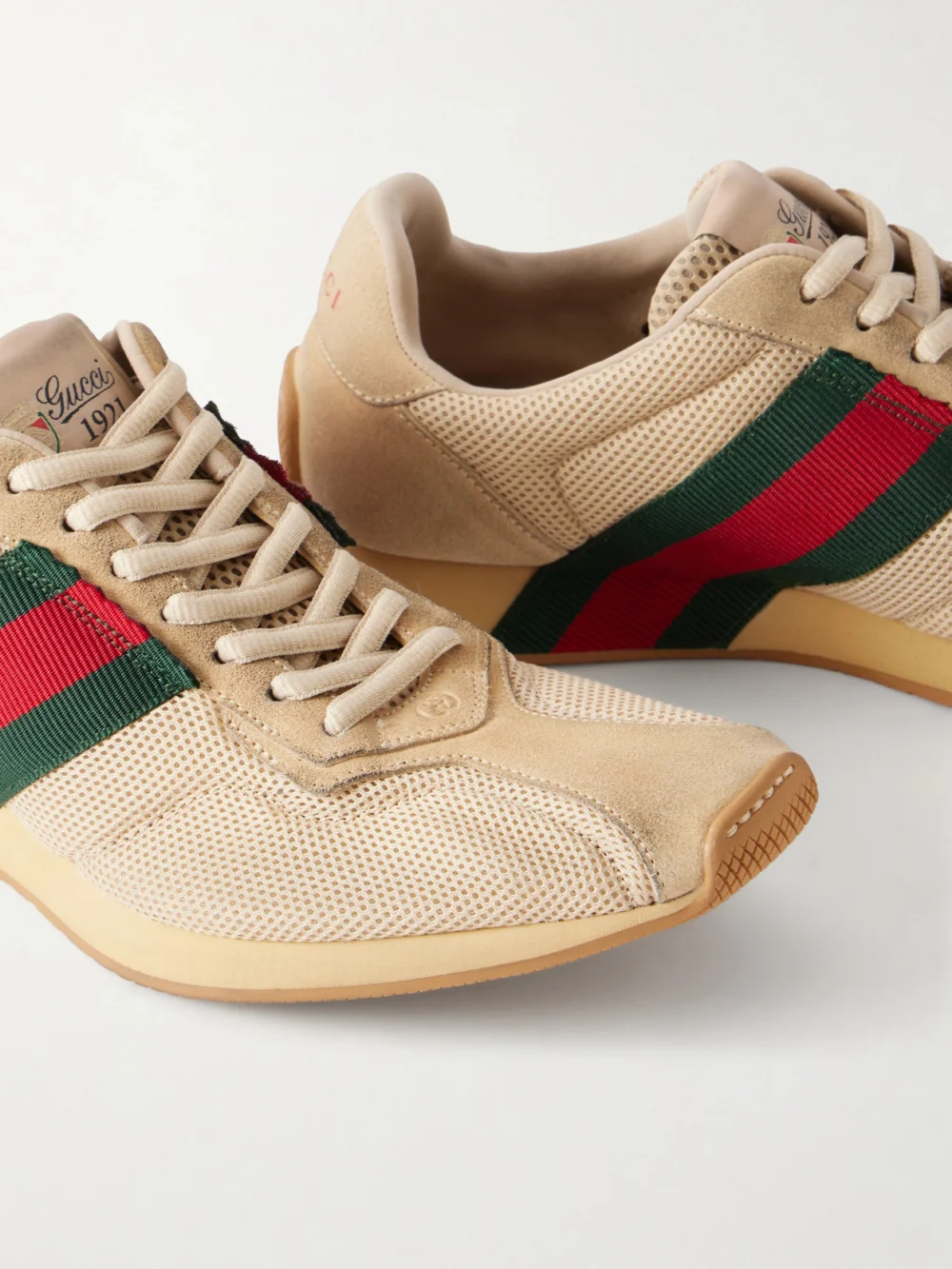 Close-up detail of the Gucci Tempo Web-detailed Suede-trimmed Mesh Sneakers