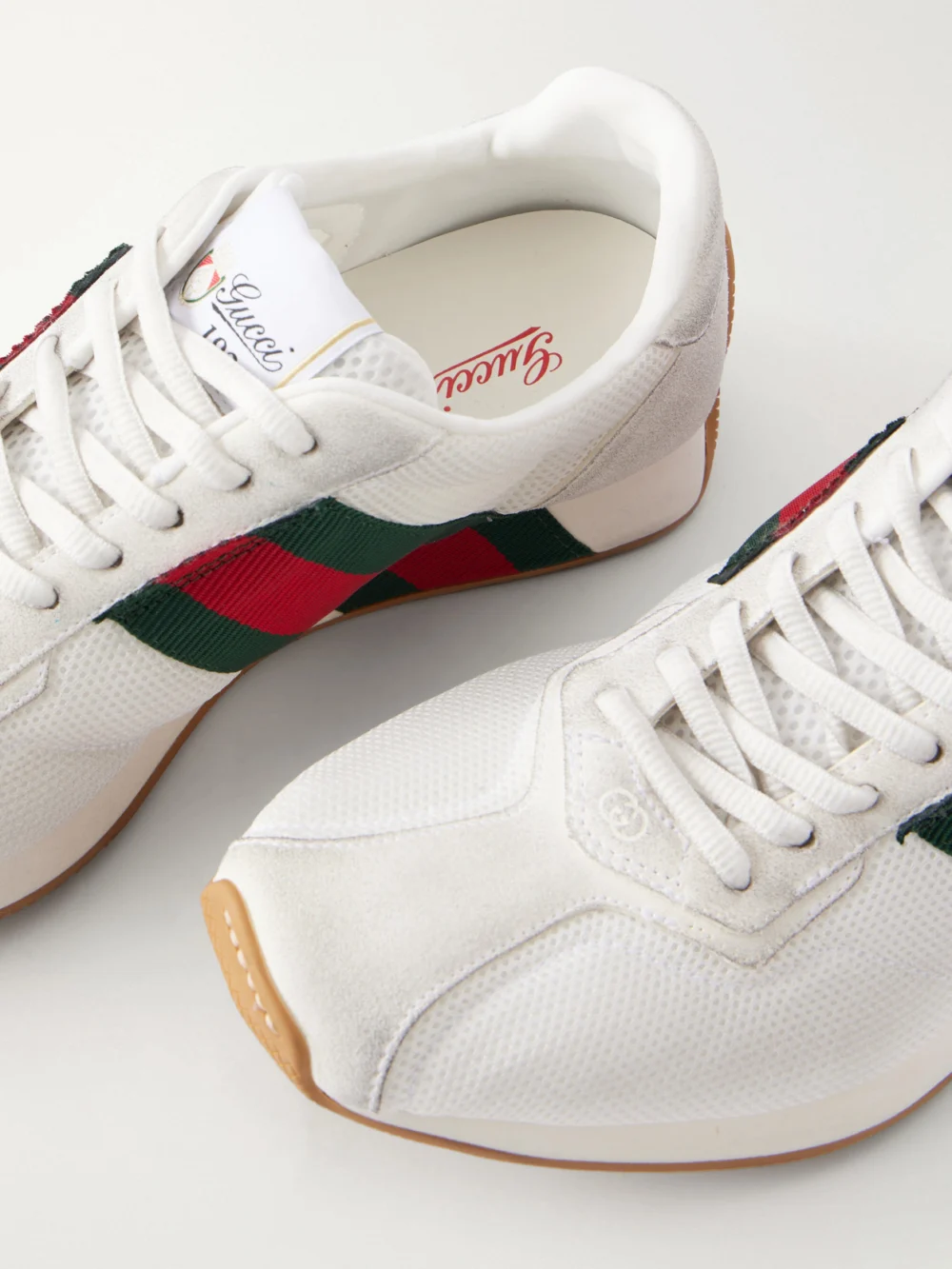 Close-up detail of the Gucci Tempo Web-detailed Suede-trimmed Mesh Sneakers