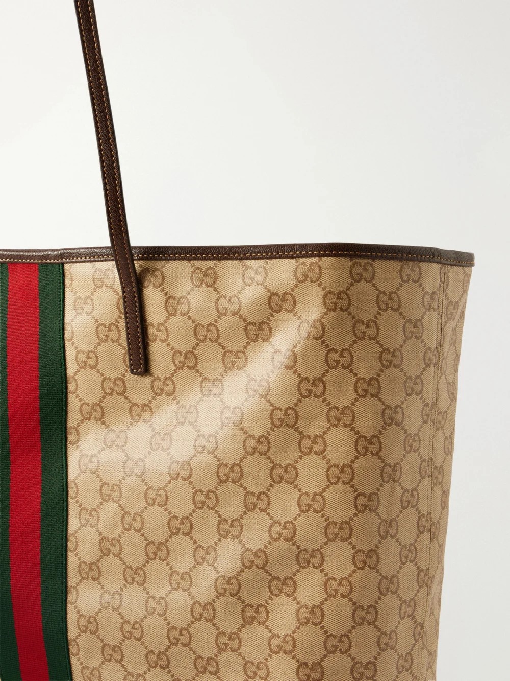Close-up detail of the Gucci Tribeca Leather-trimmed Coated Canvas-jacquard Tote