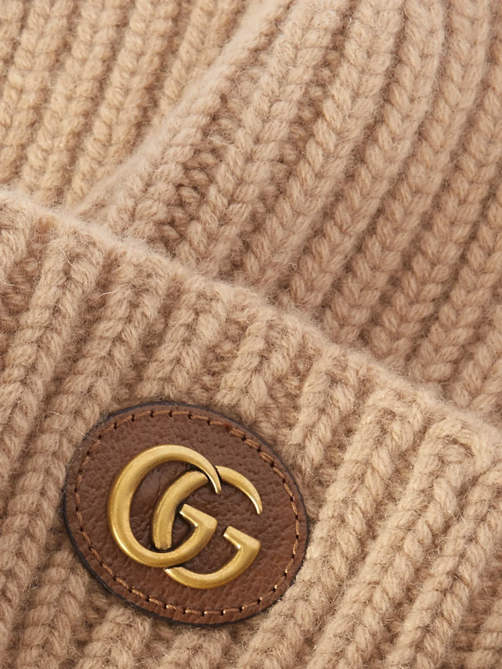 Close-up detail of the Gucci Victor Appliquéd Ribbed Wool and Cashmere-blend Beanie
