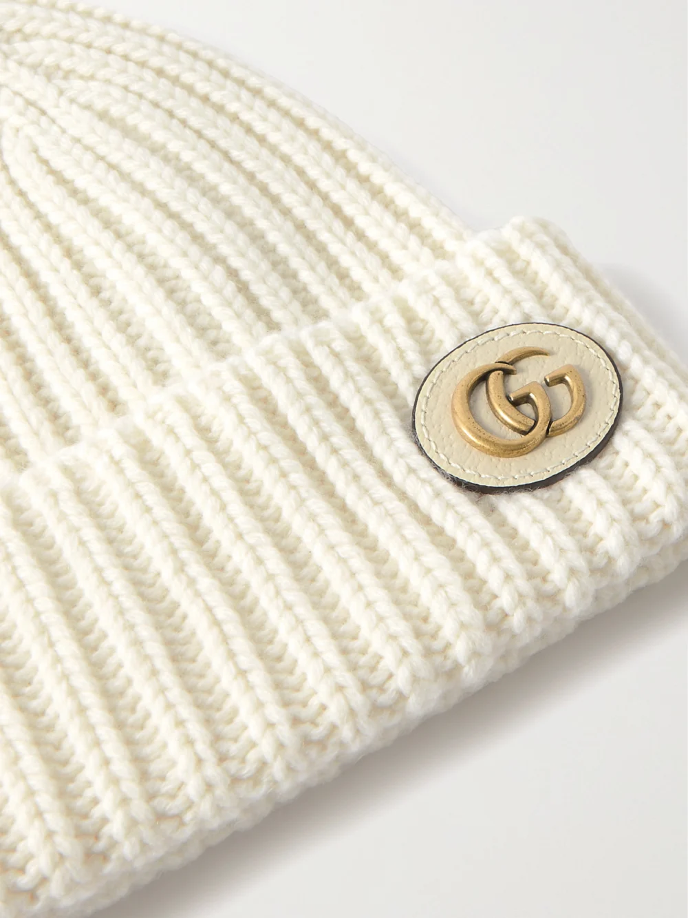 Close-up detail of the Gucci Victor Appliquéd Ribbed Wool and Cashmere-blend Beanie