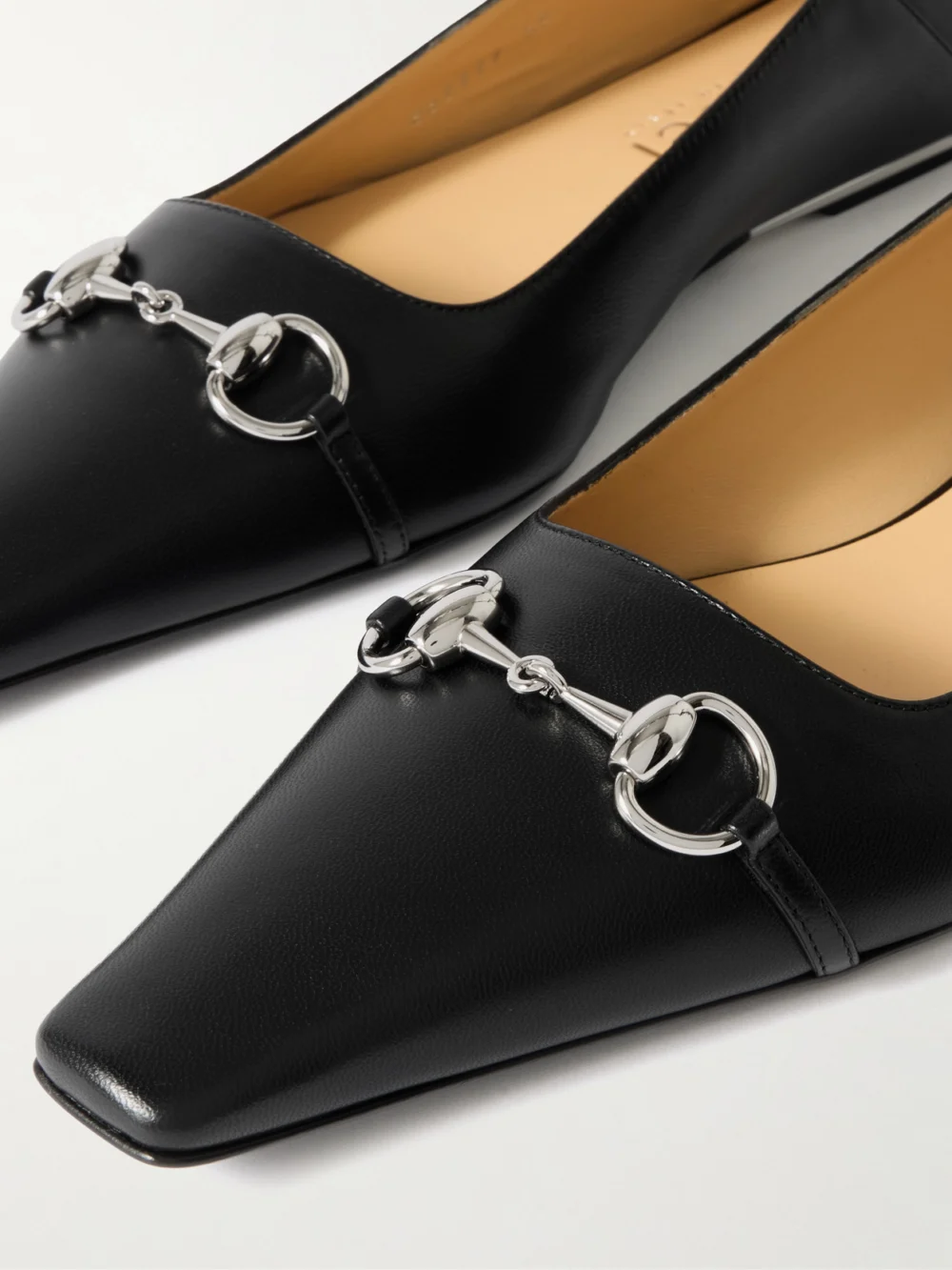 Close-up detail of the Gucci Vittoria Collapsible-heel Horsebit-embellished Leather Ballet Flats