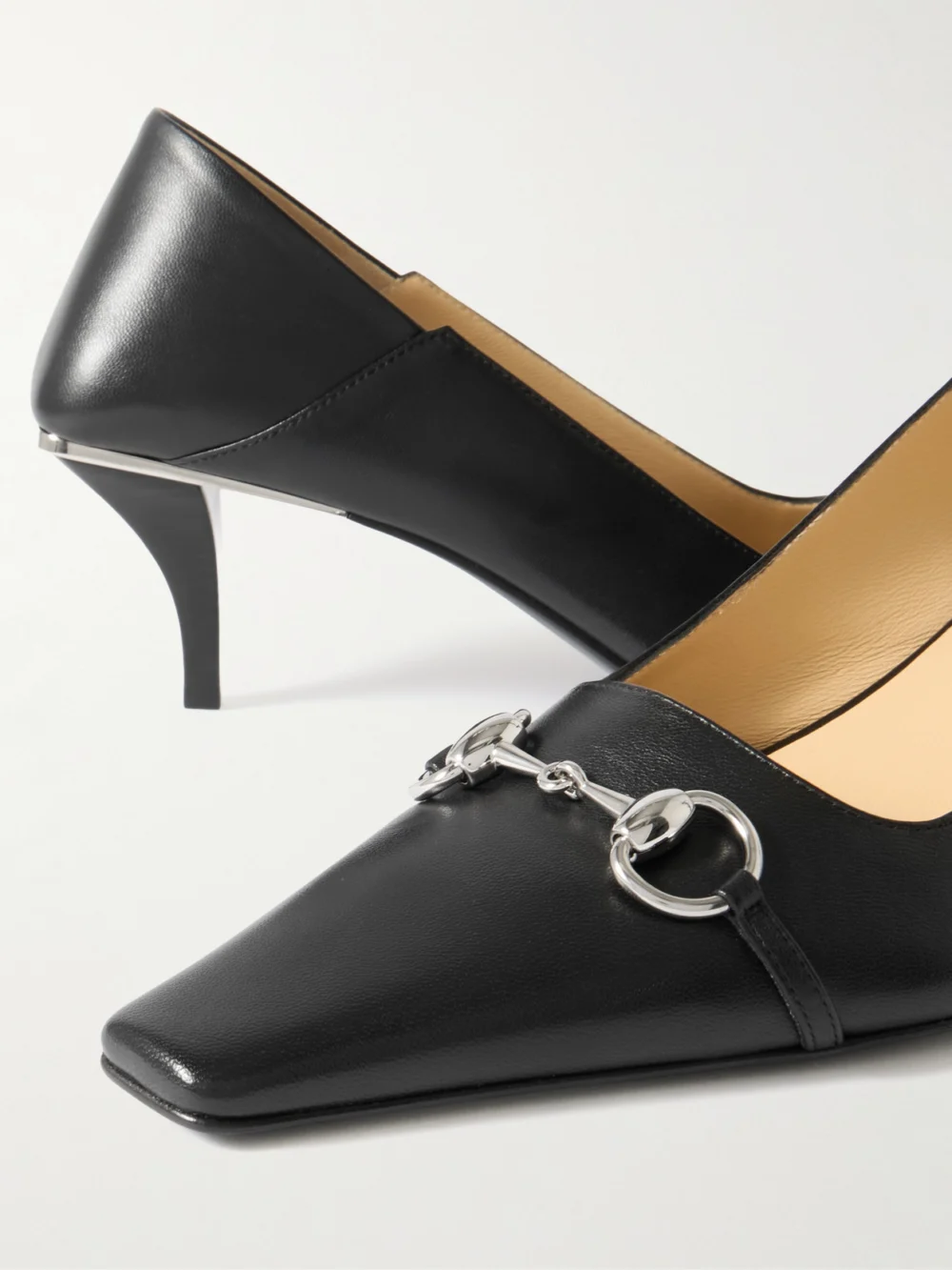 Close-up detail of the Gucci Vittoria Collapsible-heel Horsebit-embellished Leather Pumps