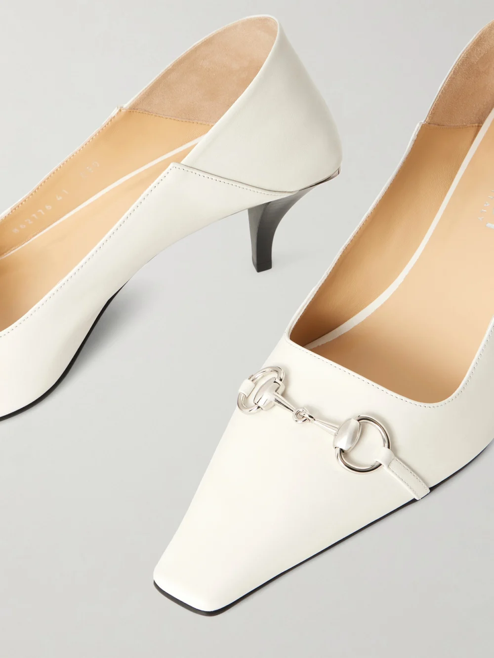 Close-up detail of the Gucci Vittoria Collapsible-heel Horsebit-embellished Leather Pumps