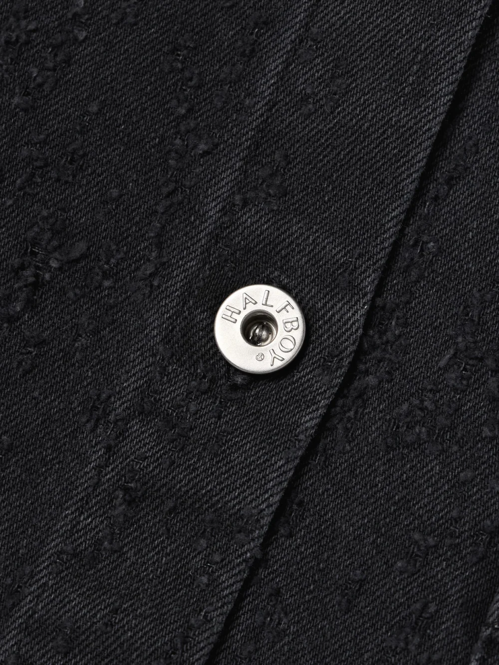 Close-up detail of the Halfboy Cropped Distressed Denim Shirt
