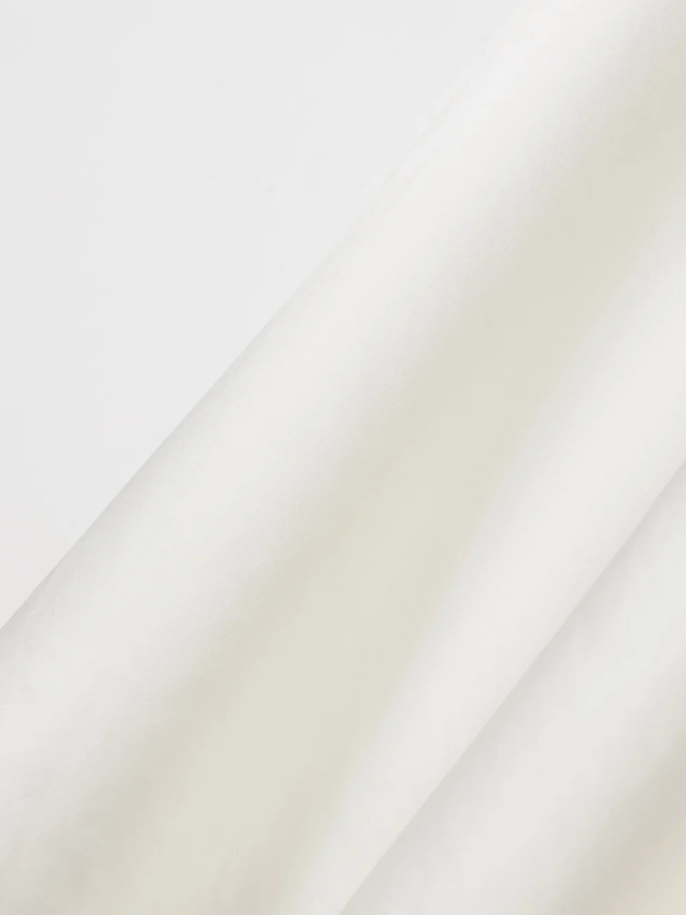Close-up detail of the Halfpenny London Bloom Open-back Satin-crepe Mini Dress
