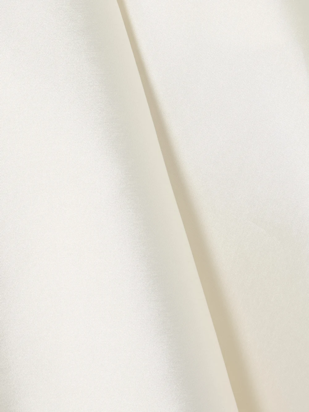 Close-up detail of the Halfpenny London Strapless Pleated Mikado Midi Dress