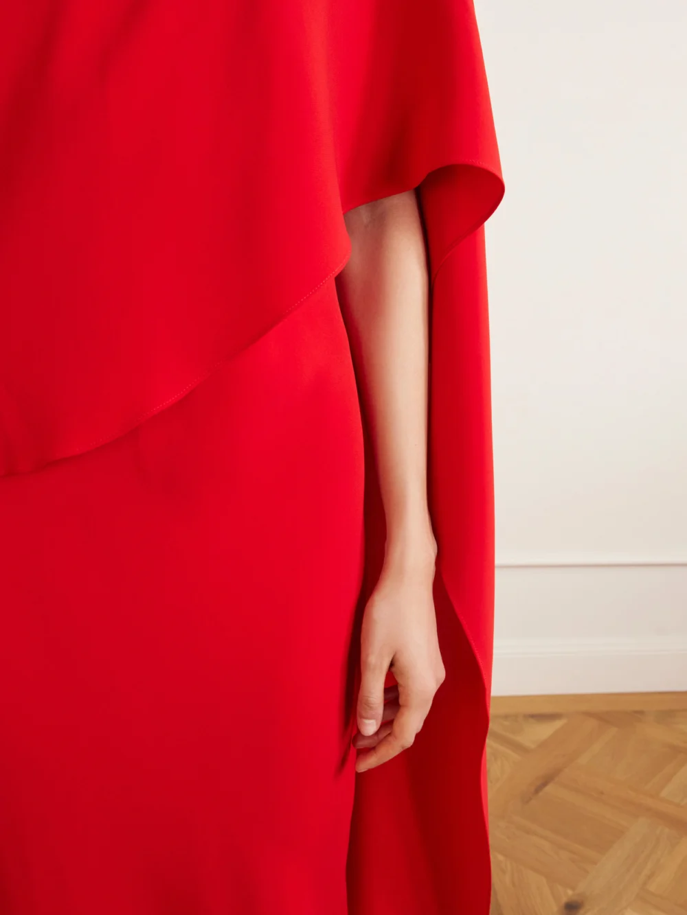 Close-up detail of the Heirlome Clementine Draped Silk-crepe Maxi Dress