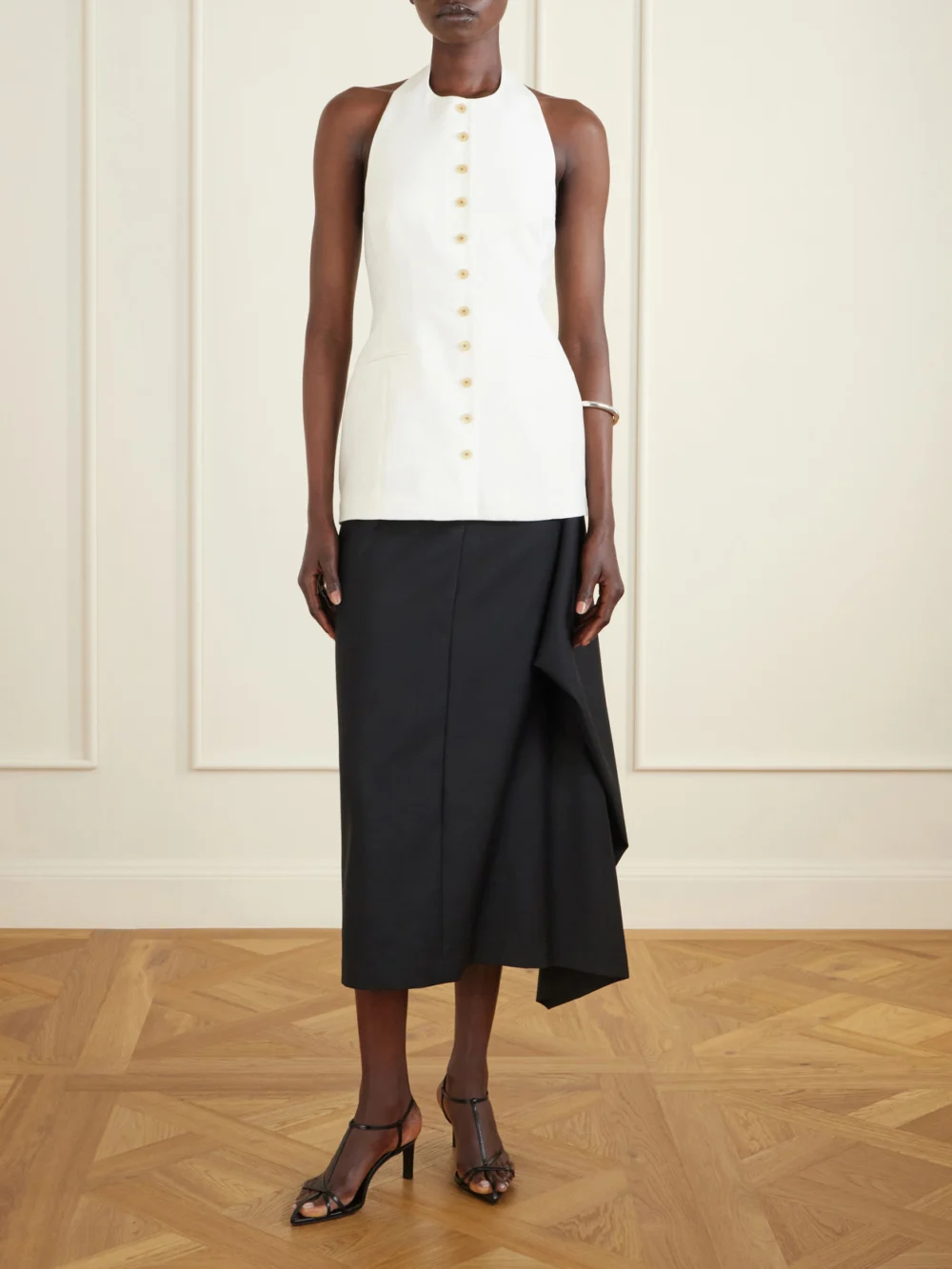 Heirlome Lupita Halterneck Sleeveless Wool and Silk-blend Top, worn by a model