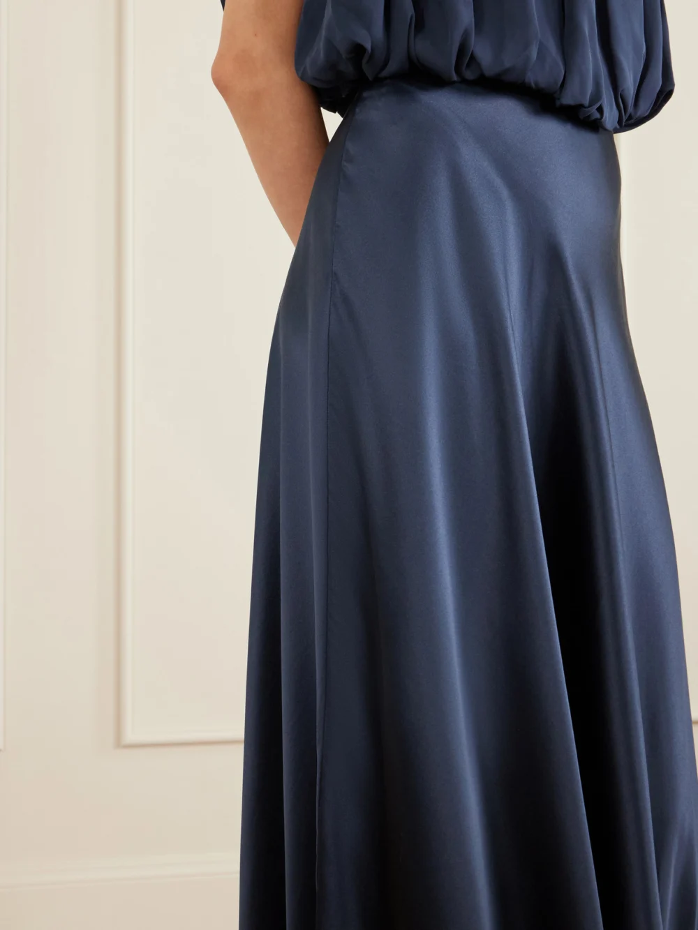Close-up detail of the Heirlome Penelope Pleated Silk-crepe Top
