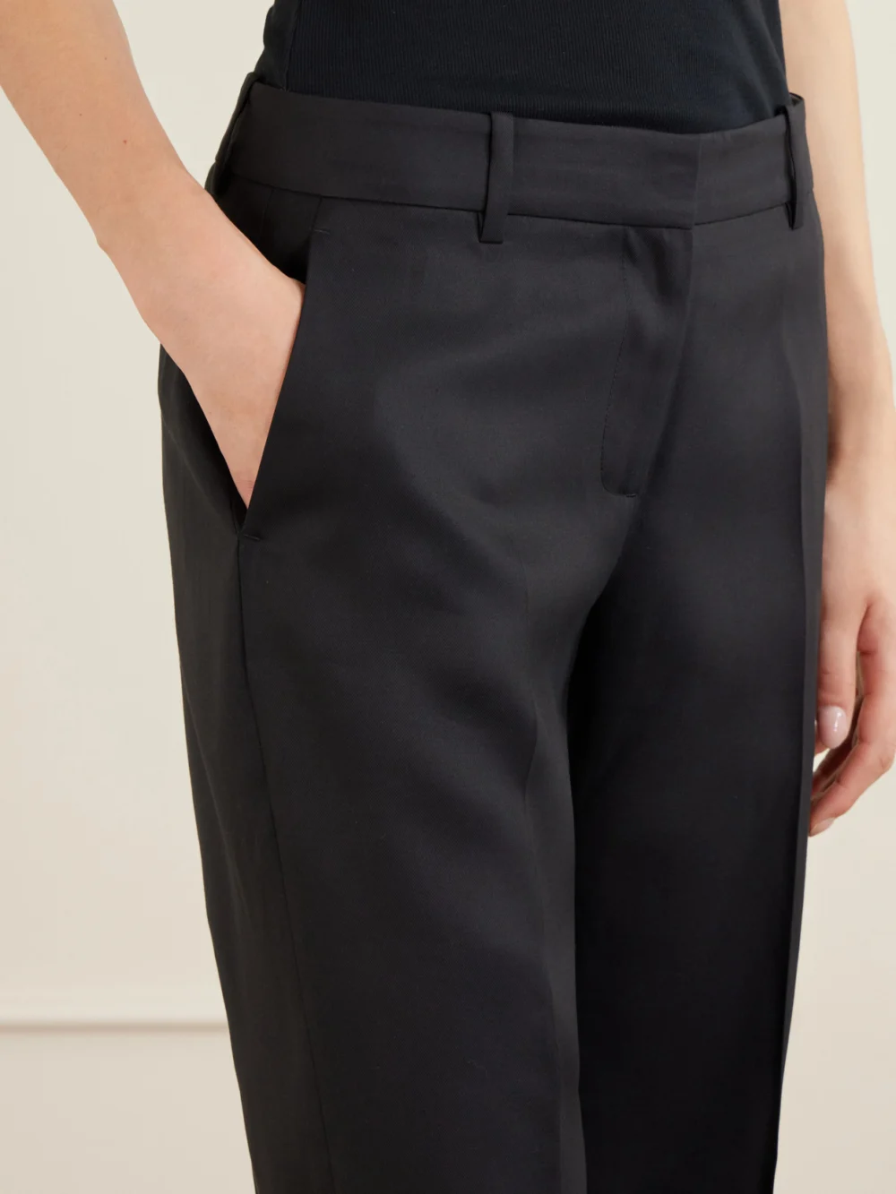 Close-up detail of the Heirlome Petula Pleated Silk-twill Straight-leg Pants