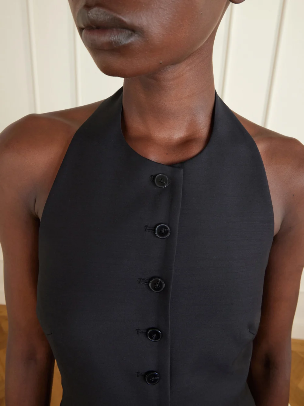 Close-up detail of the Heirlome Sarah Wool and Silk-blend Halterneck Midi Dress
