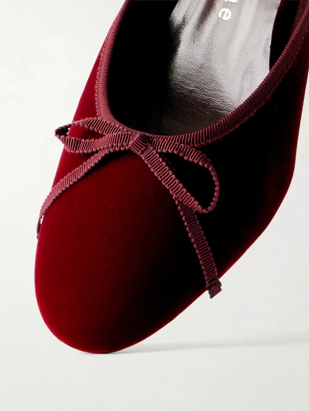 Close-up detail of the Herbert Levine 24/7 50 Bow-detailed Velvet Pumps