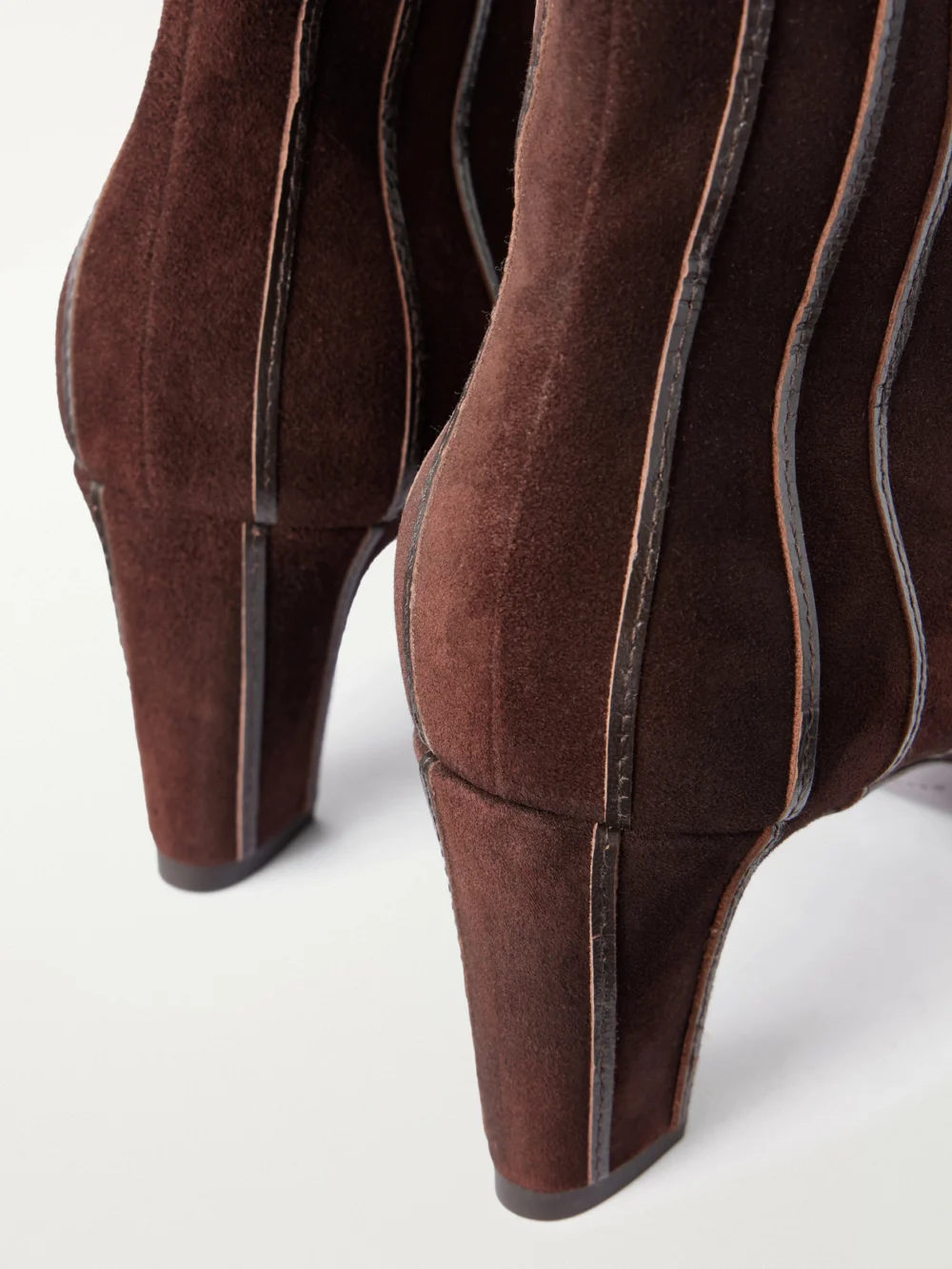 Close-up detail of the Herbert Levine A Fine Line 65 Leather-trimmed Suede Ankle Boots