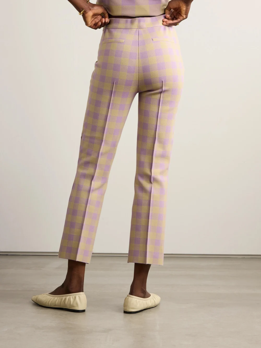 Back view of the High Sport Kick Cropped Checked Stretch-cotton Flared Pants