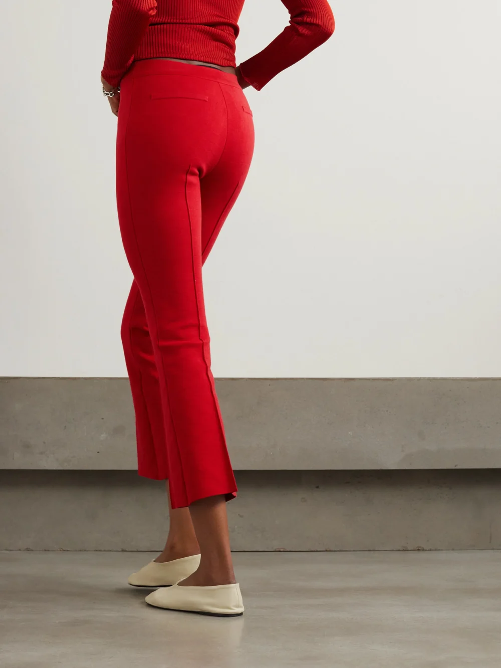 Back view of the High Sport Kick Cropped Stretch-cotton Flared Pants