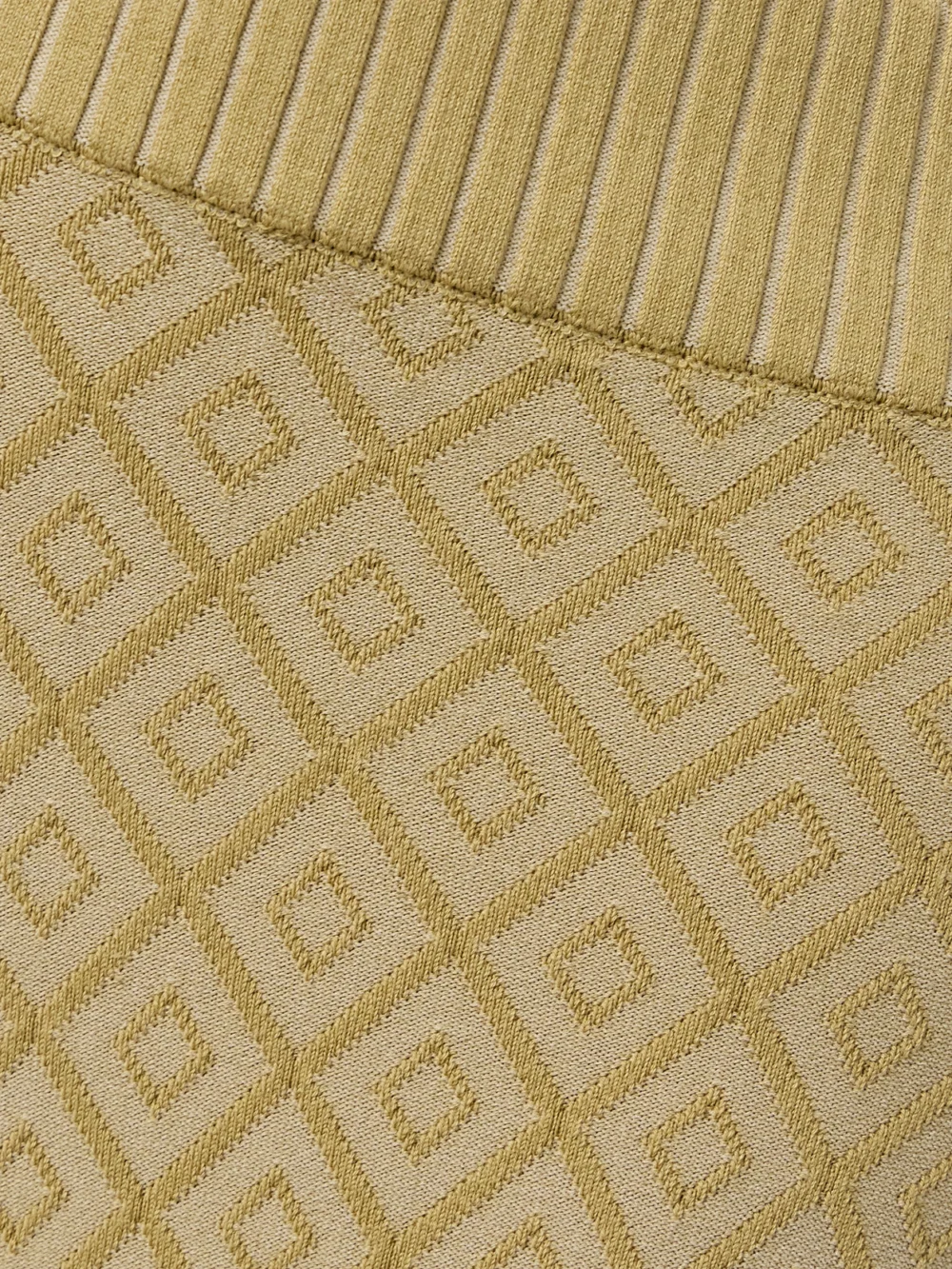 Close-up detail of the High Sport Kick It Cropped Cotton-blend Jacquard Flared Pants