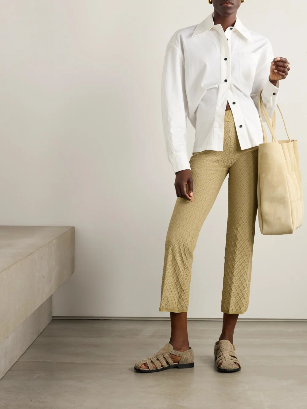 High Sport Kick It Cropped Cotton-blend Jacquard Flared Pants, worn by a model