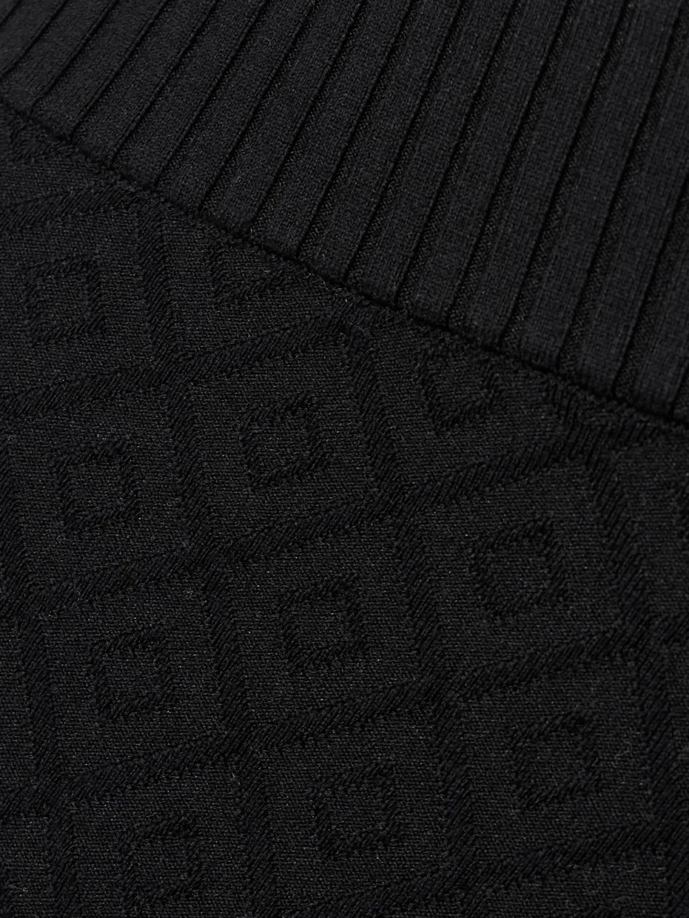 Close-up detail of the High Sport Kick It Cropped Cotton-blend Jacquard Flared Pants