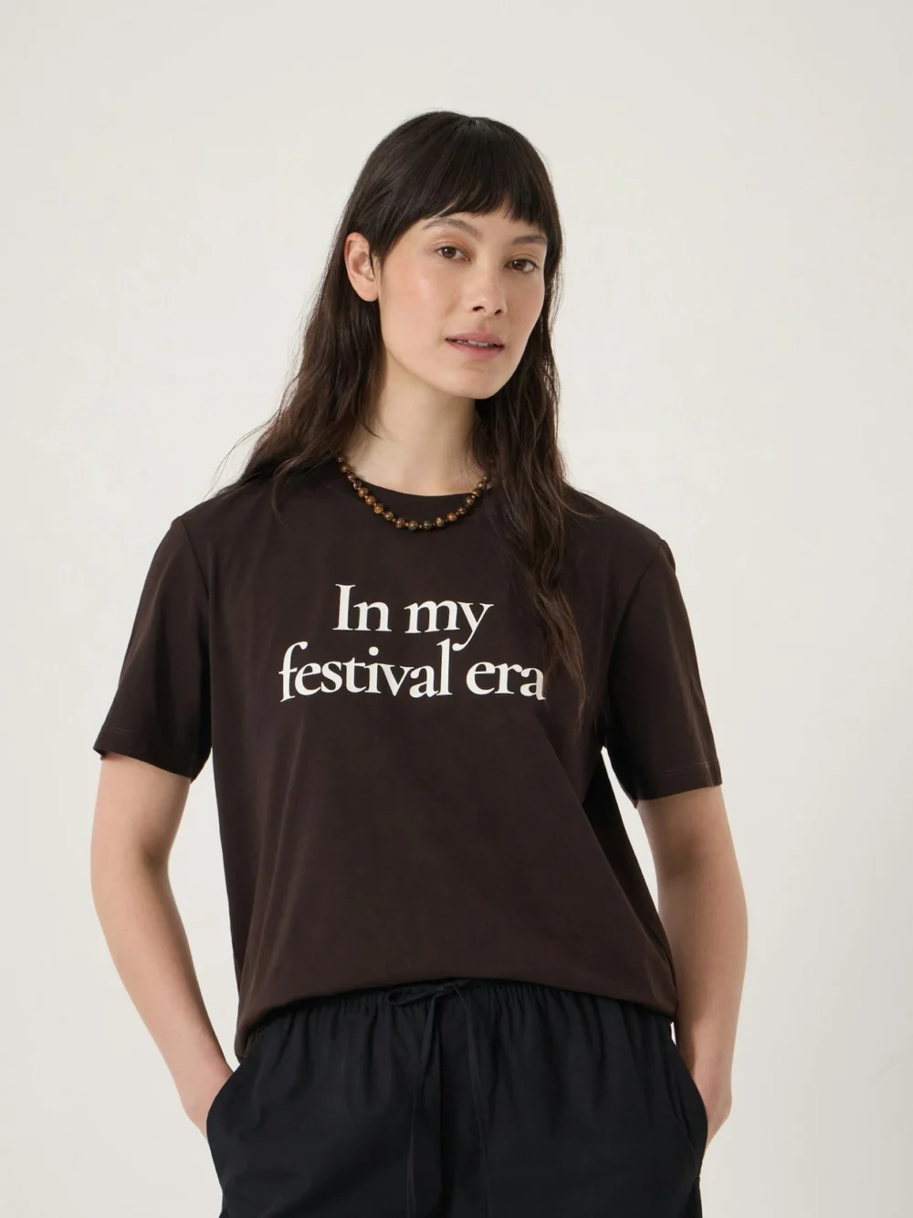 hush In My Festival Era Graphic T-Shirt in Dark Brown