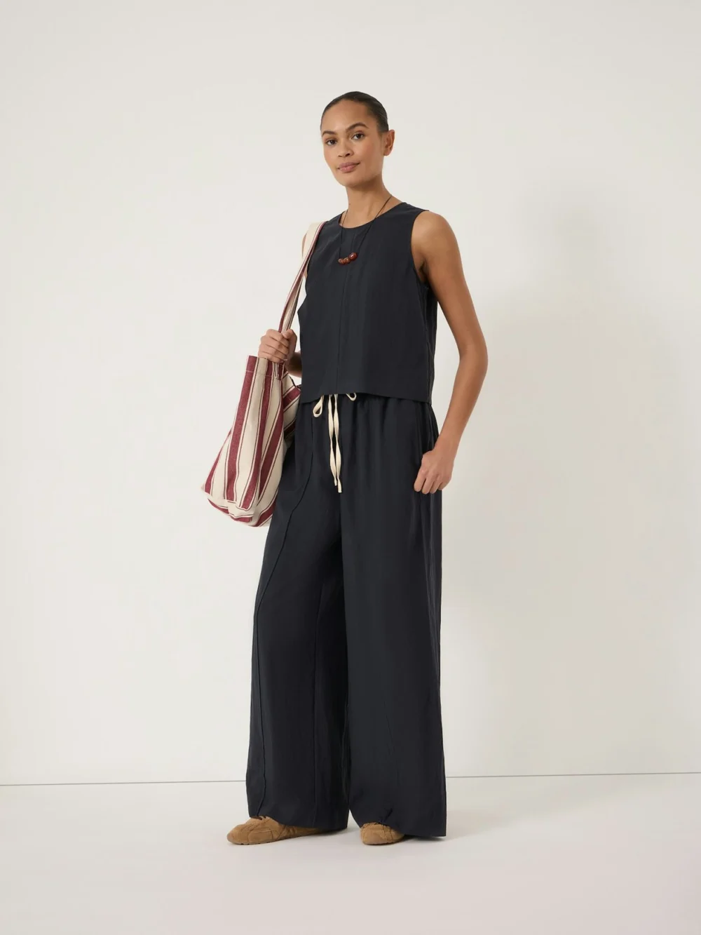 hush Peony Wide Leg Trousers in navy blue