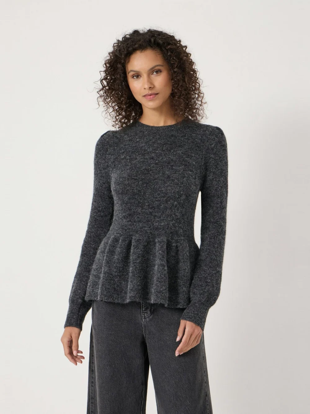 hush Wool Blend Peplum Top in charcoal marl