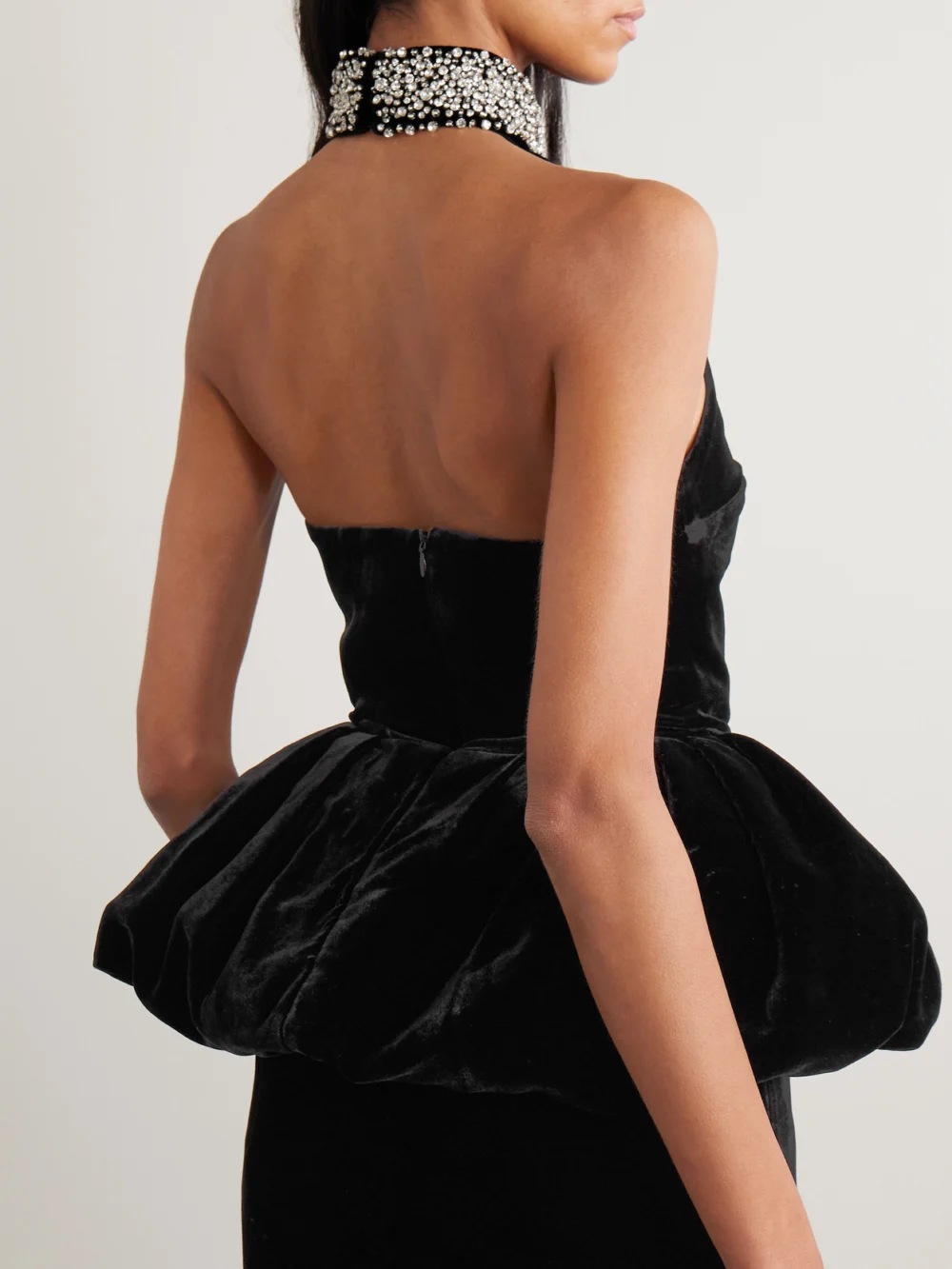 Back view of the Ilkyaz Ozel Hemingway Crystal-embellished Velvet Peplum Halterneck Top