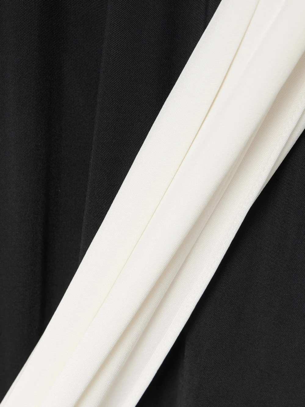Close-up detail of the Ilkyaz Ozel Leia Draped Two-tone Jersey Gown
