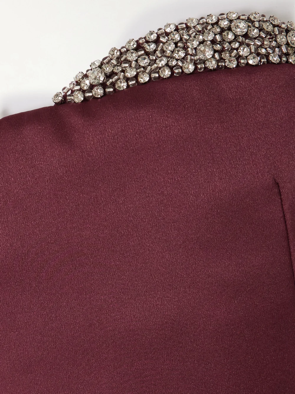 Close-up detail of the Ilkyaz Ozel Noélie Strapless Crystal-embellished Satin Maxi Dress