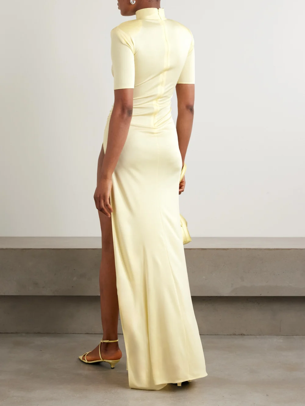 Back view of the Ilkyaz Ozel Pernille Ruched Satin-jersey Maxi Dress