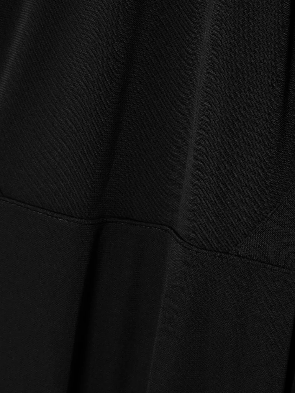 Close-up detail of the Ilkyaz Ozel Yoko Cutout Crepe Halterneck Gown